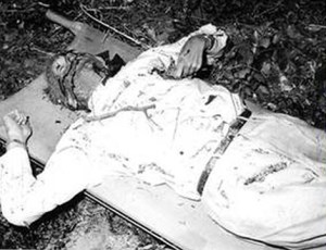 The body of Dag -- Notice the playing card in his left hand.