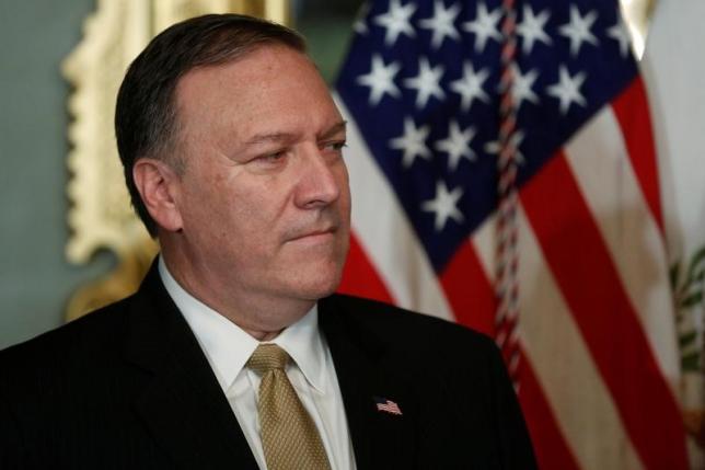 Mike Pompeo waits to be sworn in as director of the Central Intelligence Agency (CIA) in U.S. Vice President Mike Pence's ceremonial office in the Eisenhower Executive Office Building at the White House in Washington, U.S. January 23, 2017. REUTERS/Jonathan Ernst